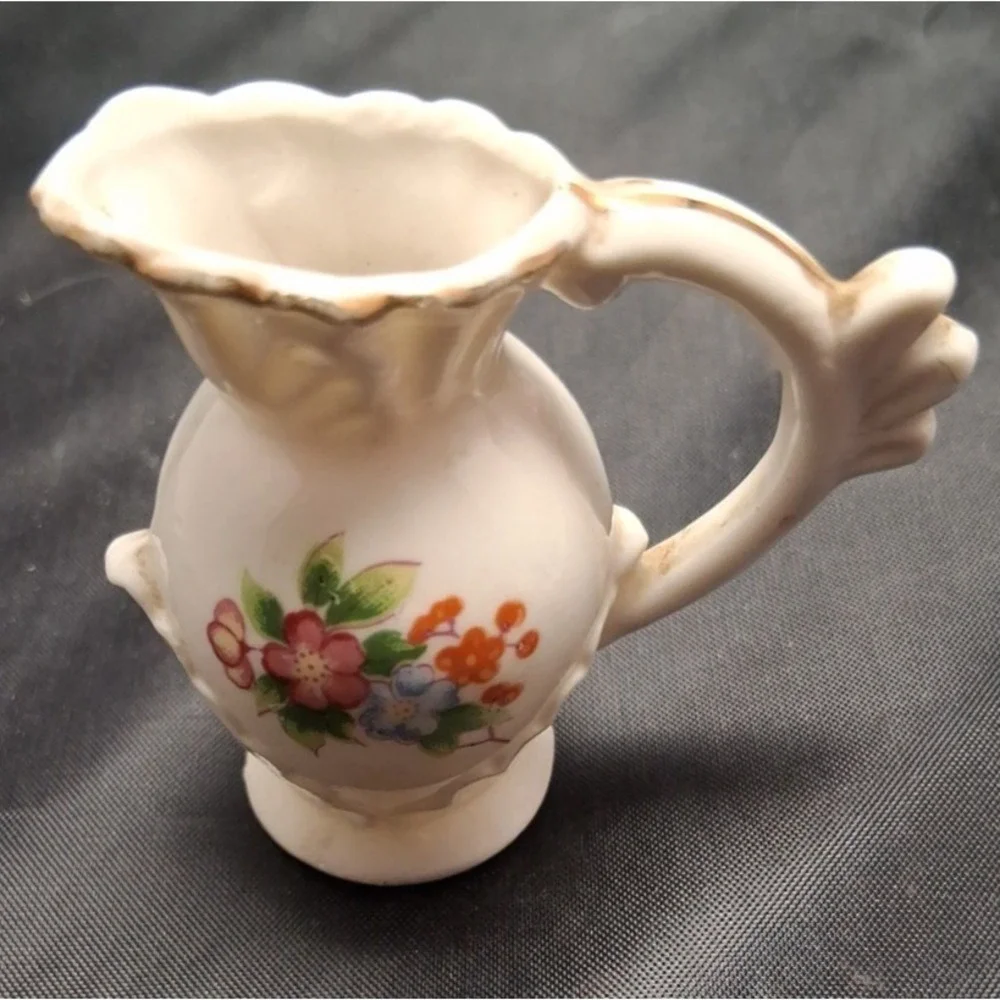 Collection of Seven Vintage Miniature Ceramic Bud Vases with Hand-Painted Design